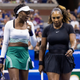 Serena Williams (R) and Venus Williams confer as they play against Czech Republic’s Lucie Hradecka and Linda Noskova during their 2022 US Open Tennis tournament women’s doubles first round match at the USTA Billie Jean King National Tennis Center in New York, on September 1, 2022. (Photo by COREY SIPKIN / AFP) (Photo by COREY SIPKIN/AFP via Getty Images)